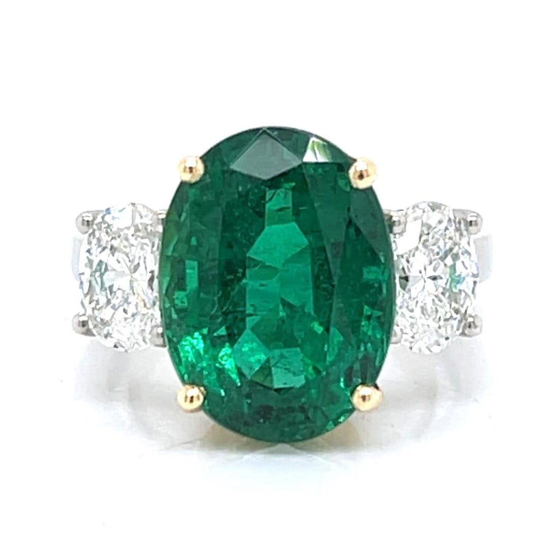 AGL Certified 7.22 Ct Emerald Diamond Ring in Platinum 14K Gold: AGL Certified 7.22 Ct Emerald Diamond Ring in Platinum 14K Gold This stunning ring features a combination of platinum and 14K yellow gold, showcasing an AGL Certified 7.22 Ct. Zambian emerald at its c