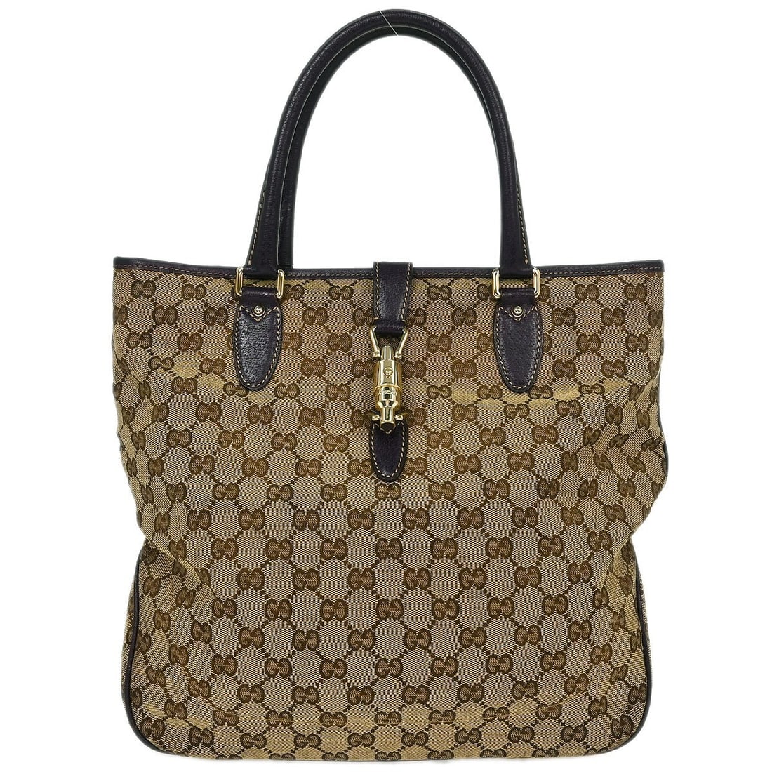 Gucci Jackie Beige Brown Canvas Leather Tote Bag: Gucci Jackie Beige Brown Canvas Leather Tote Bag This vintage Gucci Jackie tote bag features a beige canvas and leather exterior, offering a classic and timeless look. Made in Italy, the large tote is
