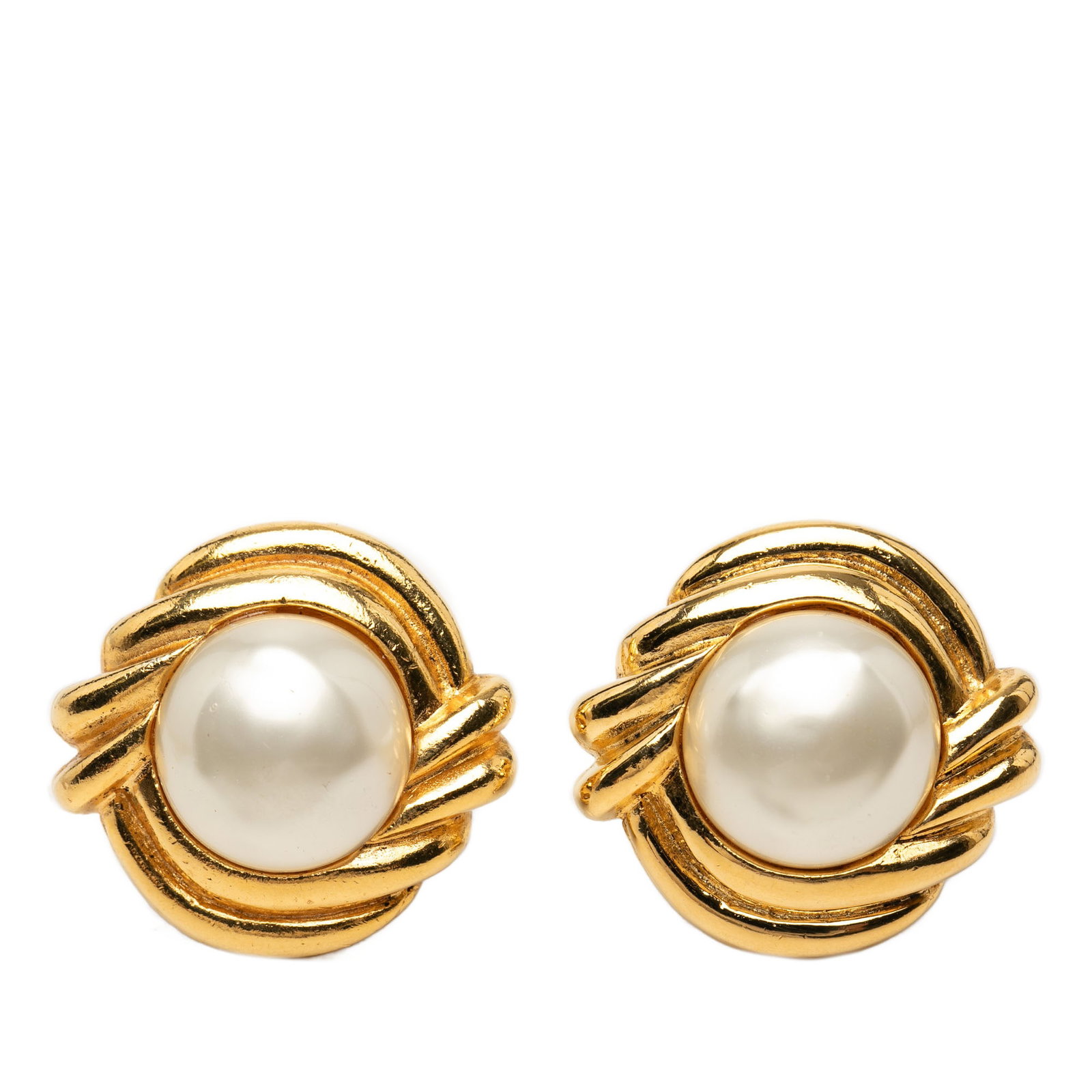Chanel faux pearl clip on earrings gold plated metal: Chanel faux pearl clip on earrings gold plated metal These Chanel clip-on earrings feature gold-plated metal bodies adorned with faux pearl accents. Designed as costume jewelry, they are crafted in Fr