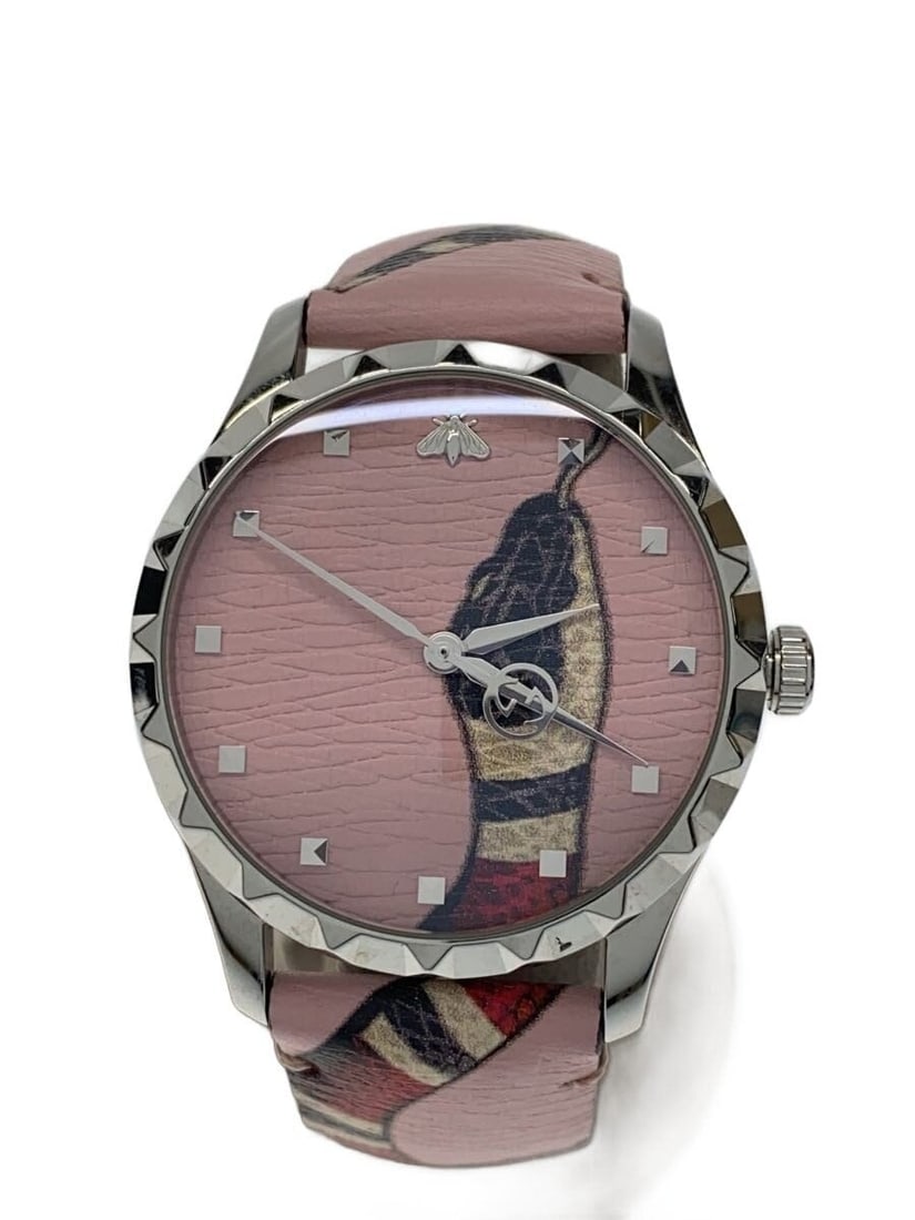 Gucci G Timeless Swiss Quartz Womens Wristwatch 126.4: Gucci G Timeless Swiss Quartz Womens Wristwatch 126.4 This GUCCI G-SHOCK Quartz 126.4 women's wristwatch features a Swiss-made quartz movement and is part of the G Timeless collection. The watch has a
