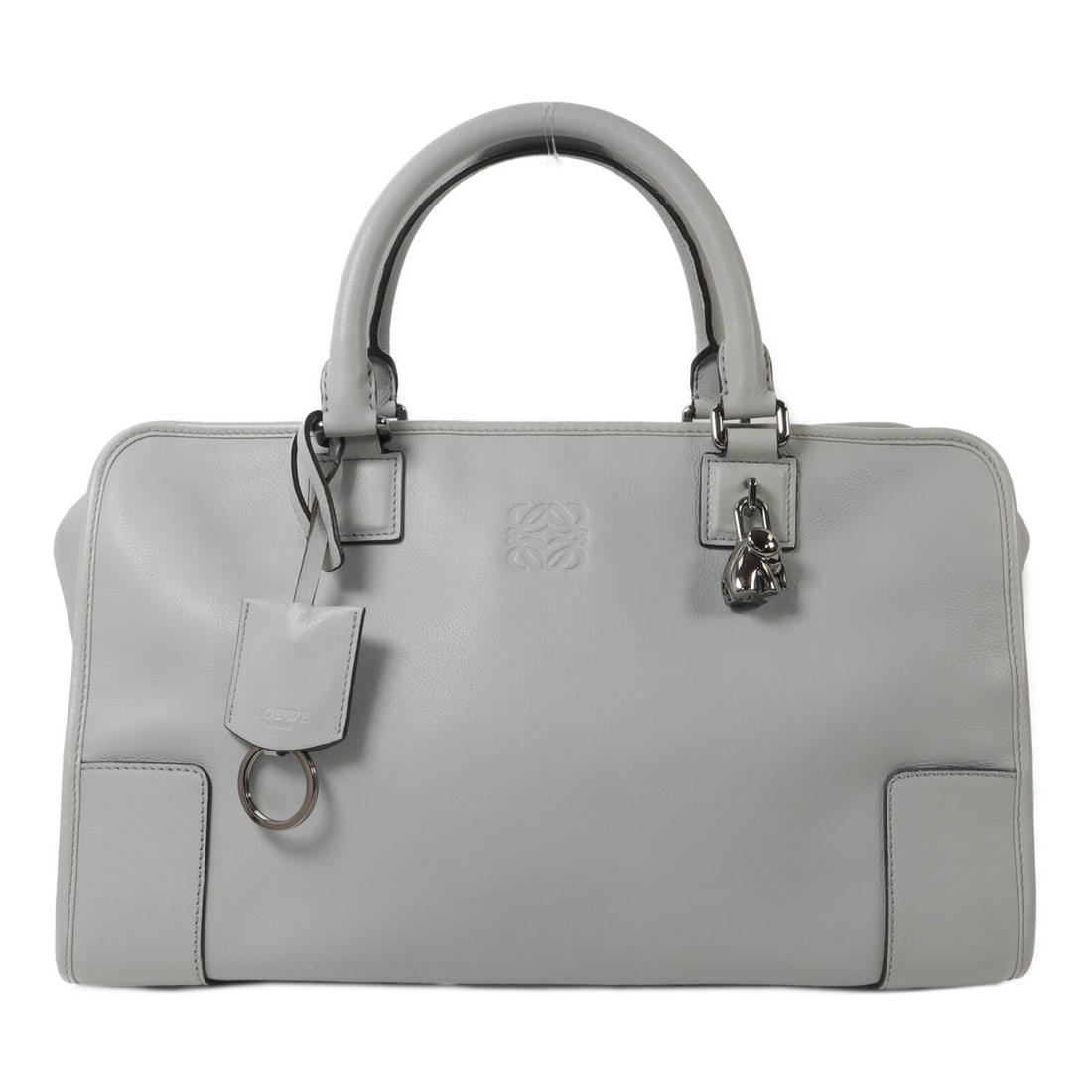 LOEWE Amazona 36 blue calfskin women handbag: LOEWE Amazona 36 blue calfskin women handbag This LOEWE Amazona 36 handbag is crafted from luxurious blue calfskin leather, offering a sophisticated and timeless accessory. Designed for women, it feat