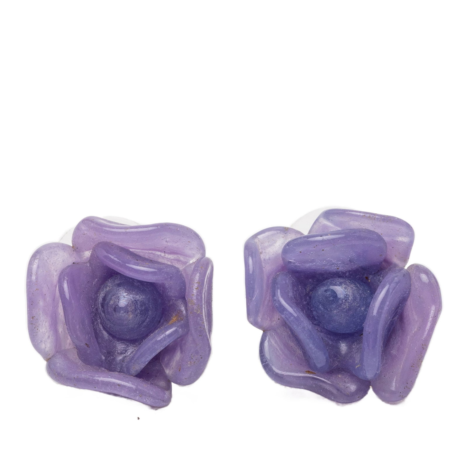 Chanel Purple Camellia Flower Resin and Silver Plated Earrings: Chanel Purple Camellia Flower Resin and Silver Plated Earrings These Chanel Camellia earrings feature a resin construction with silver plated metal accents and push back closures. The design is inspir