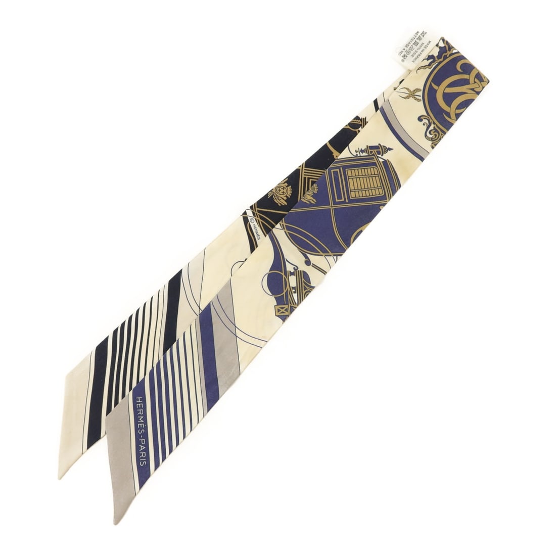 Silk Twilly Scarf for Women in Multicolor by Hermes: Silk Twilly Scarf for Women in Multicolor by Hermes Hermes Twilly scarf crafted from silk in a vibrant multicolor design. This women's accessory features a regular size and showcases the brand's signa
