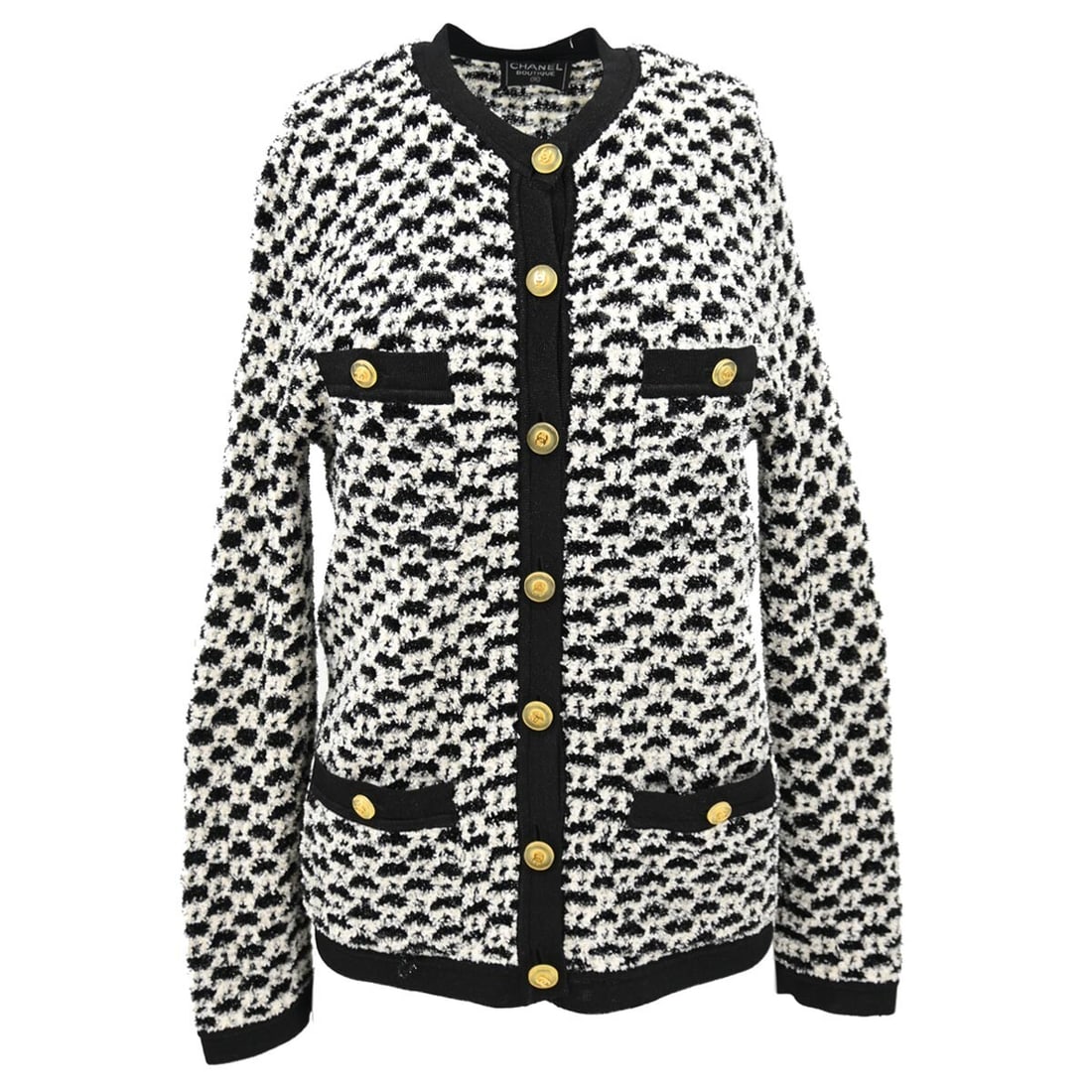 Chanel Vintage Black Knit Cardigan with Button Accents: Chanel Vintage Black Knit Cardigan with Button Accents This exquisite Chanel cardigan is designed for casual occasions, featuring long sleeves and a classic black color. Crafted from a blend of 56% ny