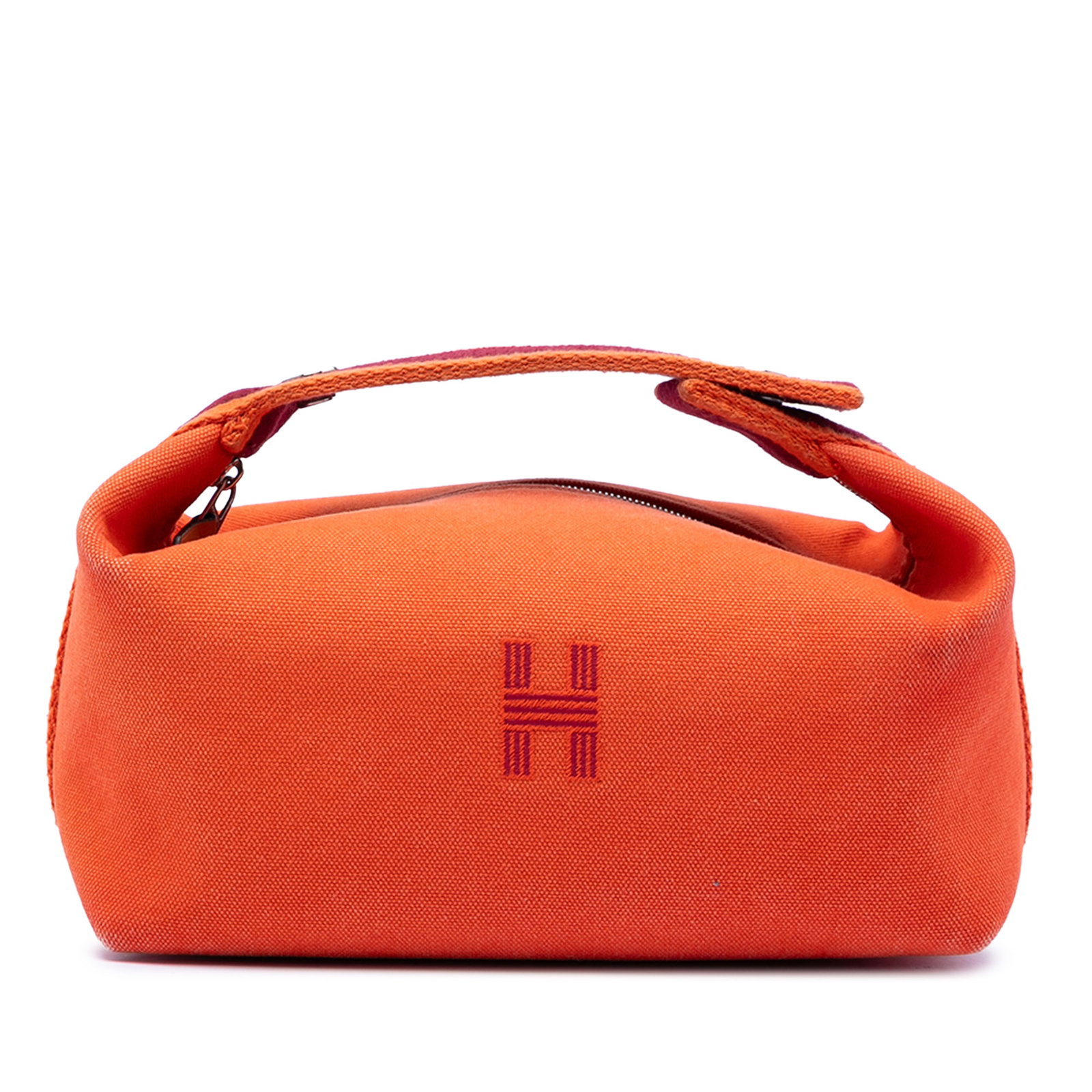 Hermes Bride-A-Brac Orange Canvas Pouch with Top Zip: Hermes Bride-A-Brac Orange Canvas Pouch with Top Zip This Hermes Small Toile Bride-A-Brac Case features an orange canvas body, a flat handle, a top zip closure, and interior slip pockets. The bag show
