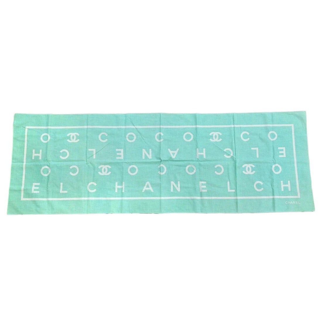 Chanel Italian Cotton Blue Small Scarf Accessory: Chanel Italian Cotton Blue Small Scarf Accessory This Chanel scarf features a light blue hue and is crafted from 100% cotton. Made in Italy, it offers a stylish and versatile accessory option. The sca
