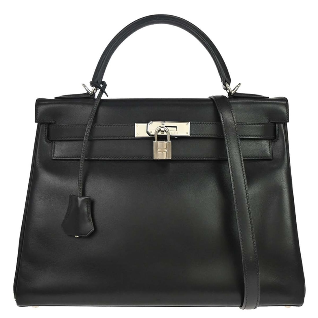 Hermes Kelly 32 black box calf top handle handbag: Hermes Kelly 32 black box calf top handle handbag This Hermes Kelly 32 Retourne handbag is crafted from black leather and features gold-tone hardware. Designed in a medium size, it offers both top han