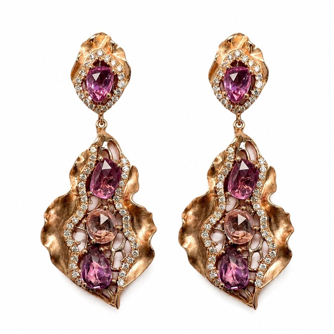 18K Rose Gold Earrings with Sapphire and Diamond: 18K Rose Gold Earrings with Sapphire and Diamond These elegant earrings are crafted from 18K rose gold and feature a combination of sparkling diamonds and vibrant sapphires. The earrings are set with 