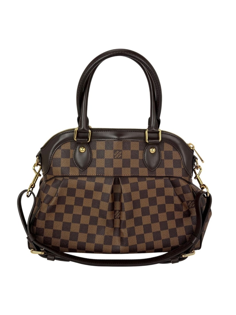 Louis Vuitton Damier Ebene Trevi PM Canvas Shoulder Purse with Detachable Strap: Louis Vuitton Damier Ebene Trevi PM Canvas Shoulder Purse with Detachable Strap This Louis Vuitton Trevi PM shoulder bag features the iconic Damier Ebene coated canvas in a trapezoid shape. It is desi