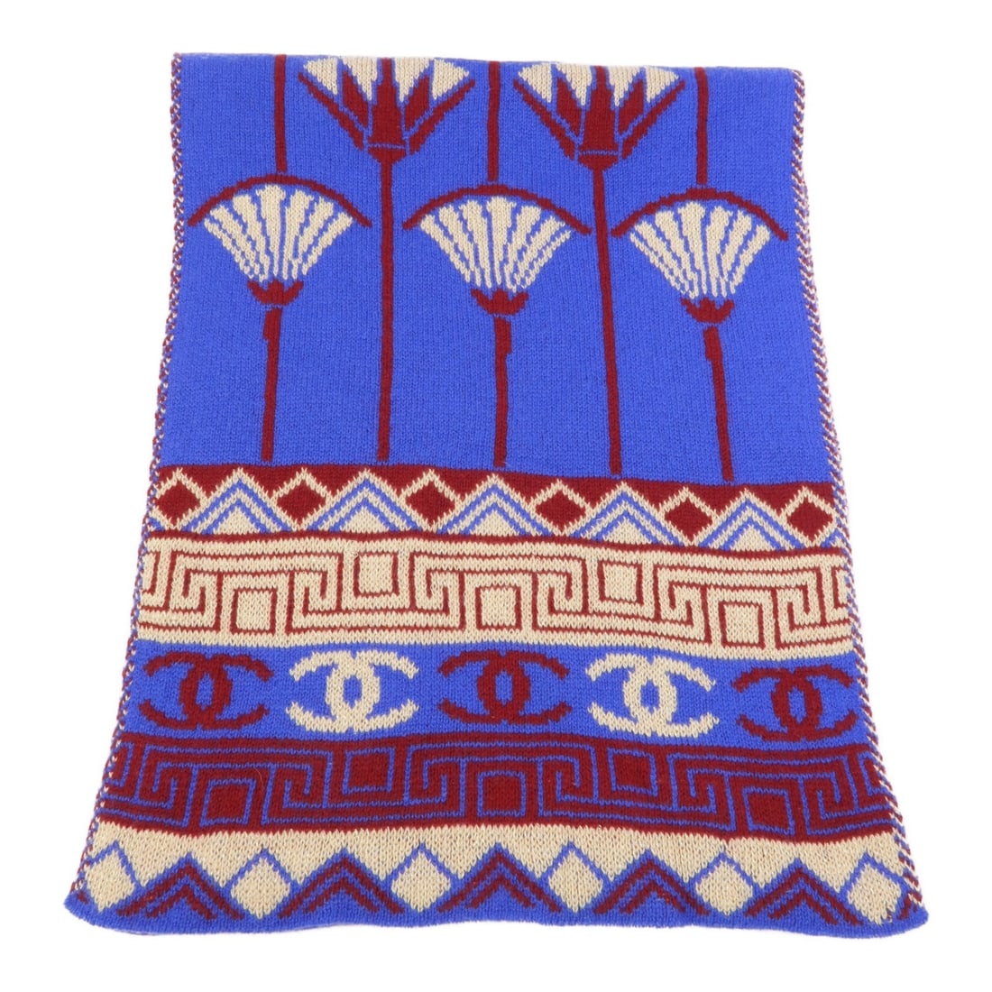 CHANEL CC cashmere viscose scarf in red and blue: CHANEL CC cashmere viscose scarf in red and blue This CHANEL scarf is crafted from a blend of cashmere and viscose, offering a soft and luxurious feel. Featuring a striking red and blue color combinat