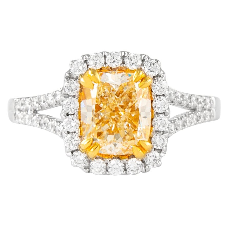 2.01ct Fancy Intense Yellow VVS2 Diamond Ring 18k Gold EGL Certified: 2.01ct Fancy Intense Yellow VVS2 Diamond Ring 18k Gold EGL Certified This exquisite 2.01ct Fancy Intense Yellow VVS2 Diamond Ring features a stunning cushion cut diamond at its center, certified by EG