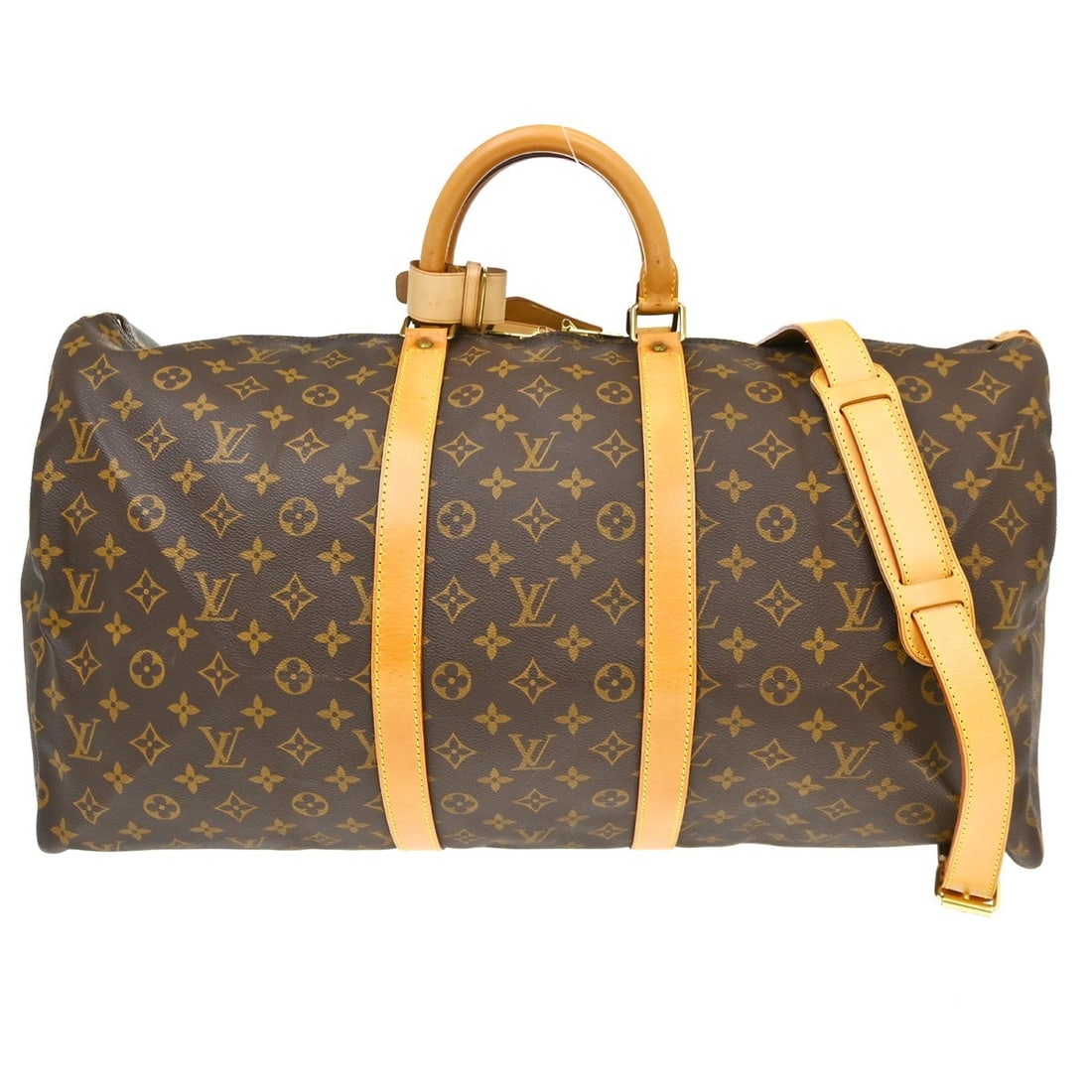 Louis Vuitton Keepall 55 Monogram Duffle Bag: Louis Vuitton Keepall 55 Monogram Duffle Bag This Louis Vuitton Keepall 55 is a vintage extra-large duffle bag crafted from the iconic monogram canvas leather with beige leather double handles. Featur