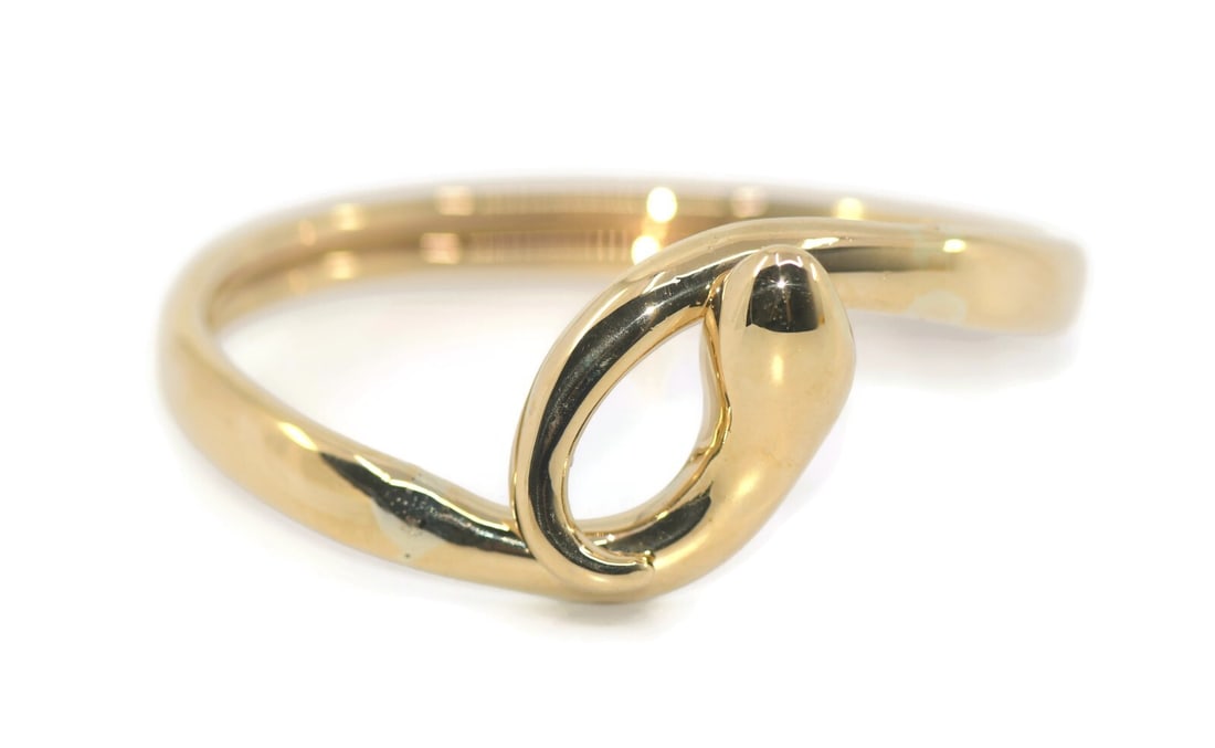 Ilias Lalaounis 18K Yellow Gold Cuff Bracelet 27g Authentic: Ilias Lalaounis 18K Yellow Gold Cuff Bracelet 27g Authentic Discover the elegance of this Illias Lalaounis 18K Yellow Gold Cuff Bracelet, a stunning piece that showcases the luxury of fine craftsmansh