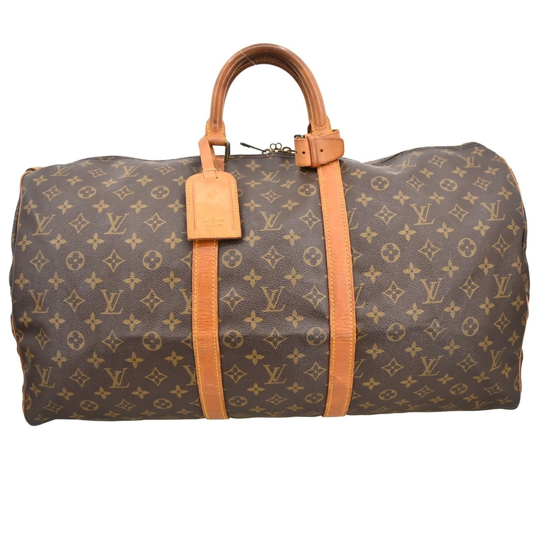 Louis Vuitton Keepall 55 Monogram Duffle Travel Bag: Louis Vuitton Keepall 55 Monogram Duffle Travel Bag This Louis Vuitton Keepall 55 is a vintage extra-large travel handbag crafted from monogram canvas leather with beige leather double handles. Design
