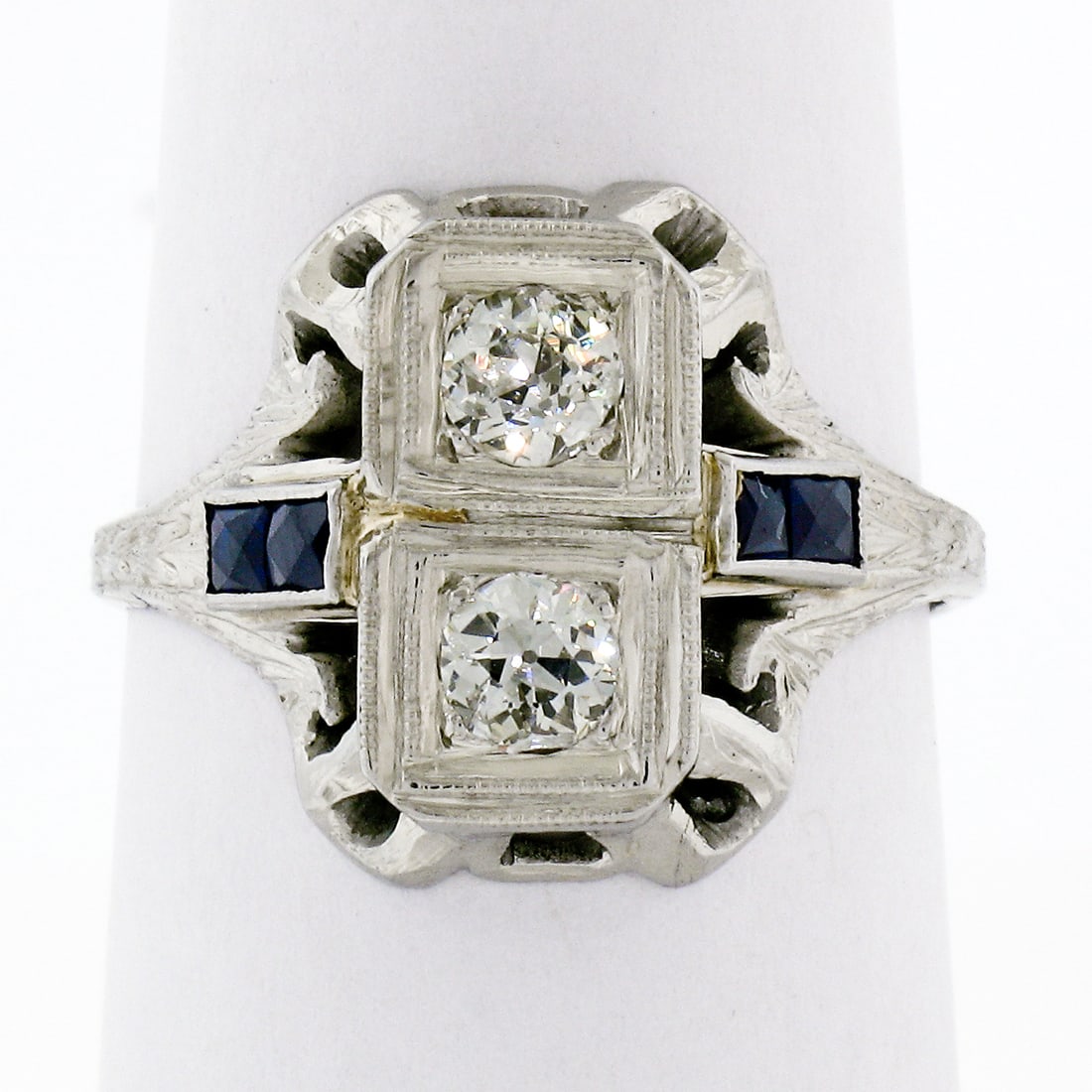 Antique Art Deco 18K White Gold Diamond Sapphire Ring 0.46ctw: Antique Art Deco 18K White Gold Diamond Sapphire Ring 0.46ctw Discover this exquisite Antique Art Deco Dinner Ring crafted in solid 18K white gold. This stunning piece features two natural genuine old