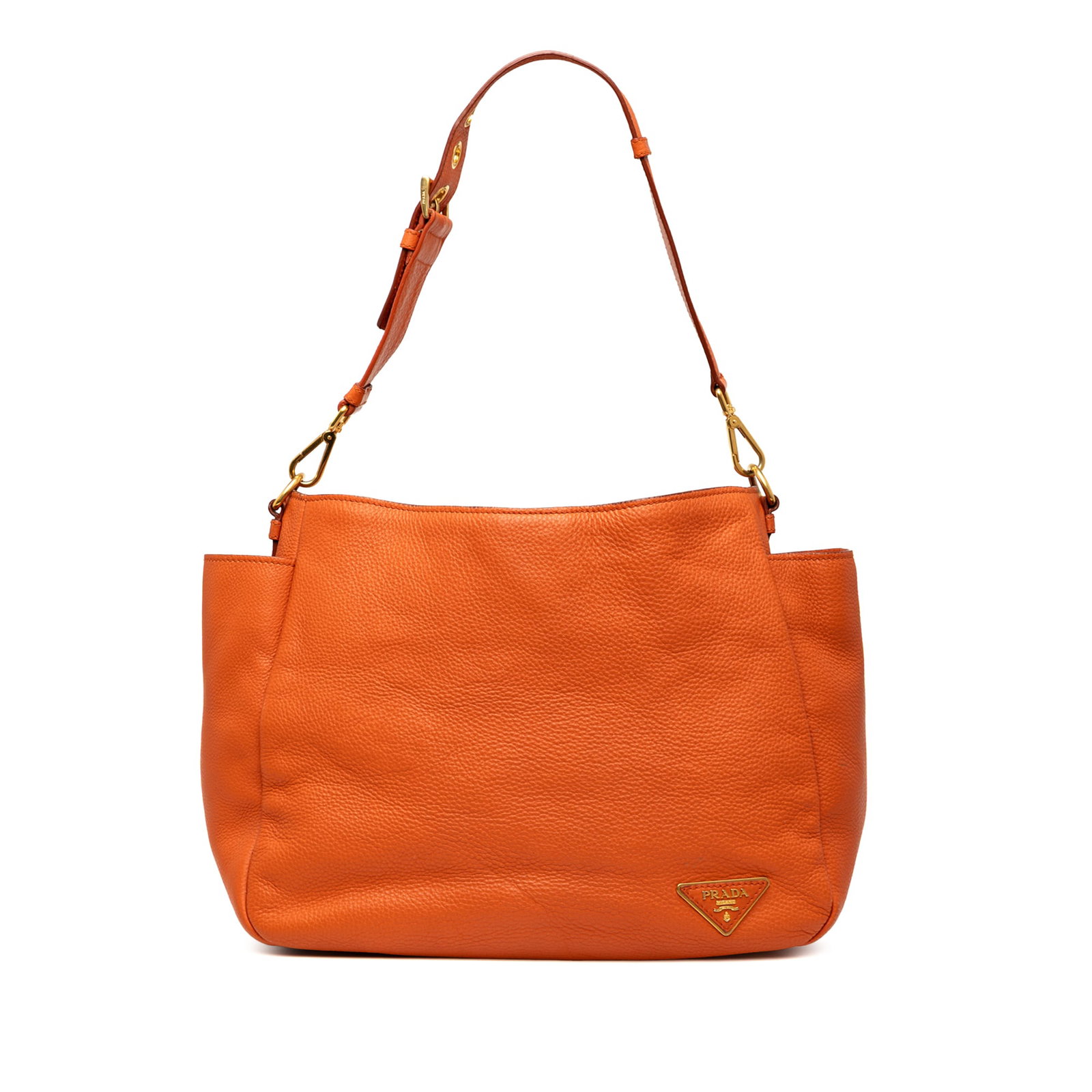 Prada Vitello Daino Orange Leather Shoulder Bag with Side Pockets: Prada Vitello Daino Orange Leather Shoulder Bag with Side Pockets This Prada Vitello Daino Side Pocket Shoulder Bag is a stylish accessory that combines luxury with practicality. Crafted from high-qua