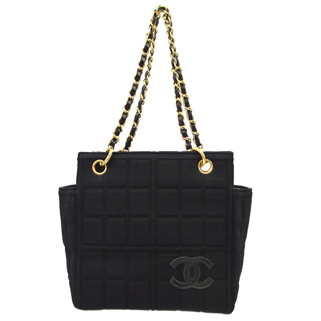 CHANEL Chocolate Bar Black Cotton Top Handle Bag: CHANEL Chocolate Bar Black Cotton Top Handle Bag This Chanel Chocolate Bar top handle bag features a quilted black cotton exterior with double handles and a structured, medium-sized silhouette. The ba
