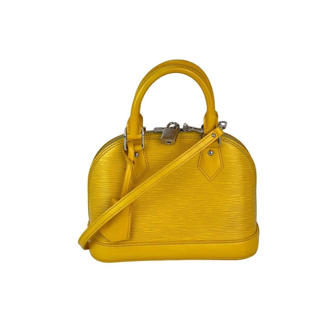 LOUIS VUITTON Alma BB Epi Leather Yellow Shoulder Bag with Silver Hardware: LOUIS VUITTON Alma BB Epi Leather Yellow Shoulder Bag with Silver Hardware Elevate your accessory collection with the LOUIS VUITTON Alma BB Epi Leather Shoulder Bag. This stylish trapezoid-shaped bag 