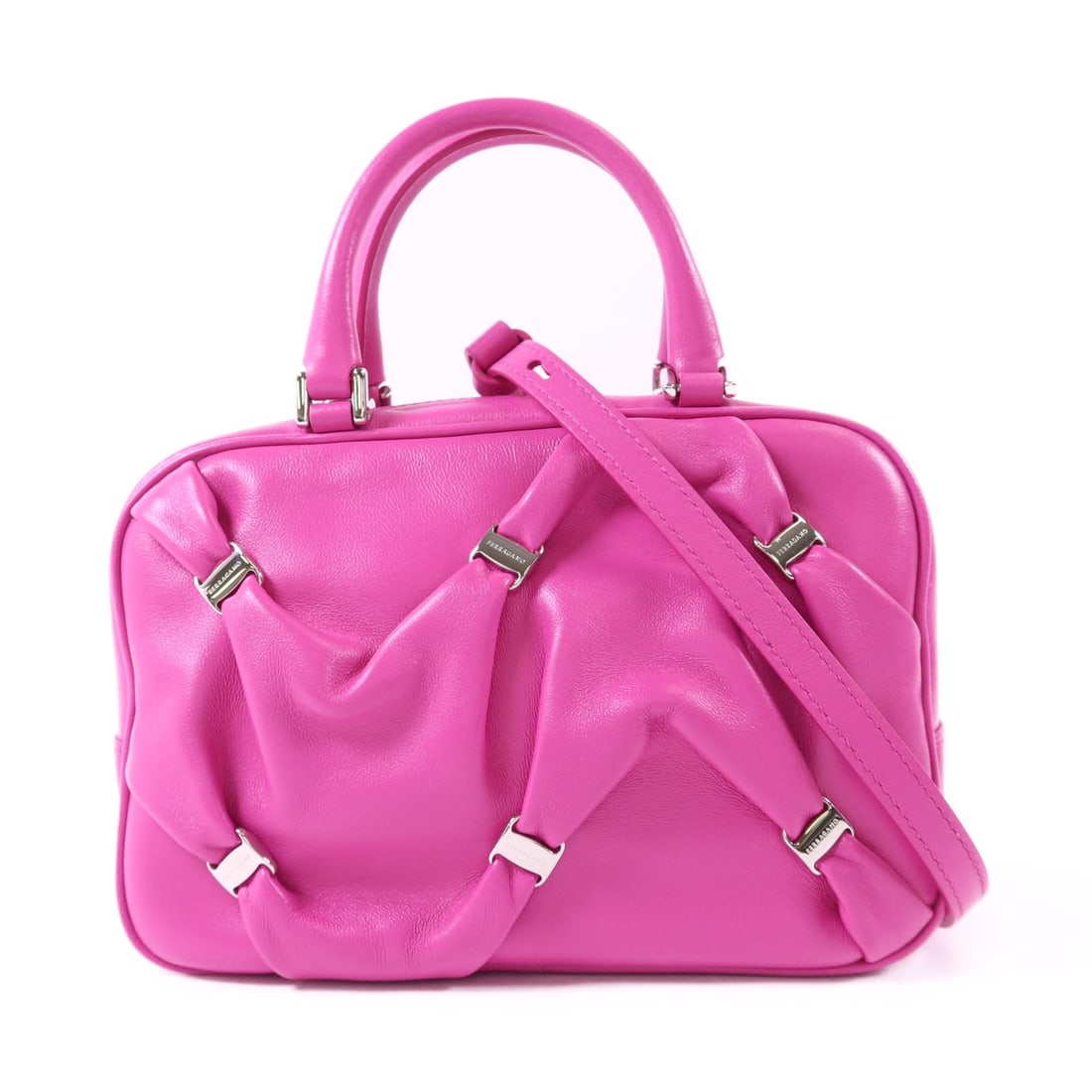 Pink Lambskin 2 Way Shoulder Bag by Salvatore Ferragamo: Pink Lambskin 2 Way Shoulder Bag by Salvatore Ferragamo This Salvatore Ferragamo 2-way shoulder bag is crafted from soft lambskin leather in a pink hue. The versatile design allows it to be carried as