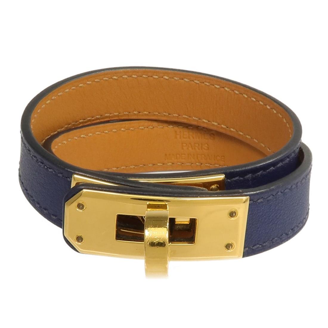 Hermes Kelly Double Tour Swift Leather Navy Bracelet GHW: Hermes Kelly Double Tour Swift Leather Navy Bracelet GHW This is a Hermes Kelly Double Tour bracelet crafted from supple Swift calfskin leather in a deep navy (Bleu Saphir) shade. Designed for women, 