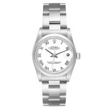 Rolex Datejust Oyster White Roman Dial Ref 78240 Papers 2002: Rolex Datejust Oyster White Roman Dial Ref 78240 Papers 2002 This Rolex Datejust features a white Roman numeral dial and a smooth bezel, paired with the classic Oyster bracelet. The watch is a men's m