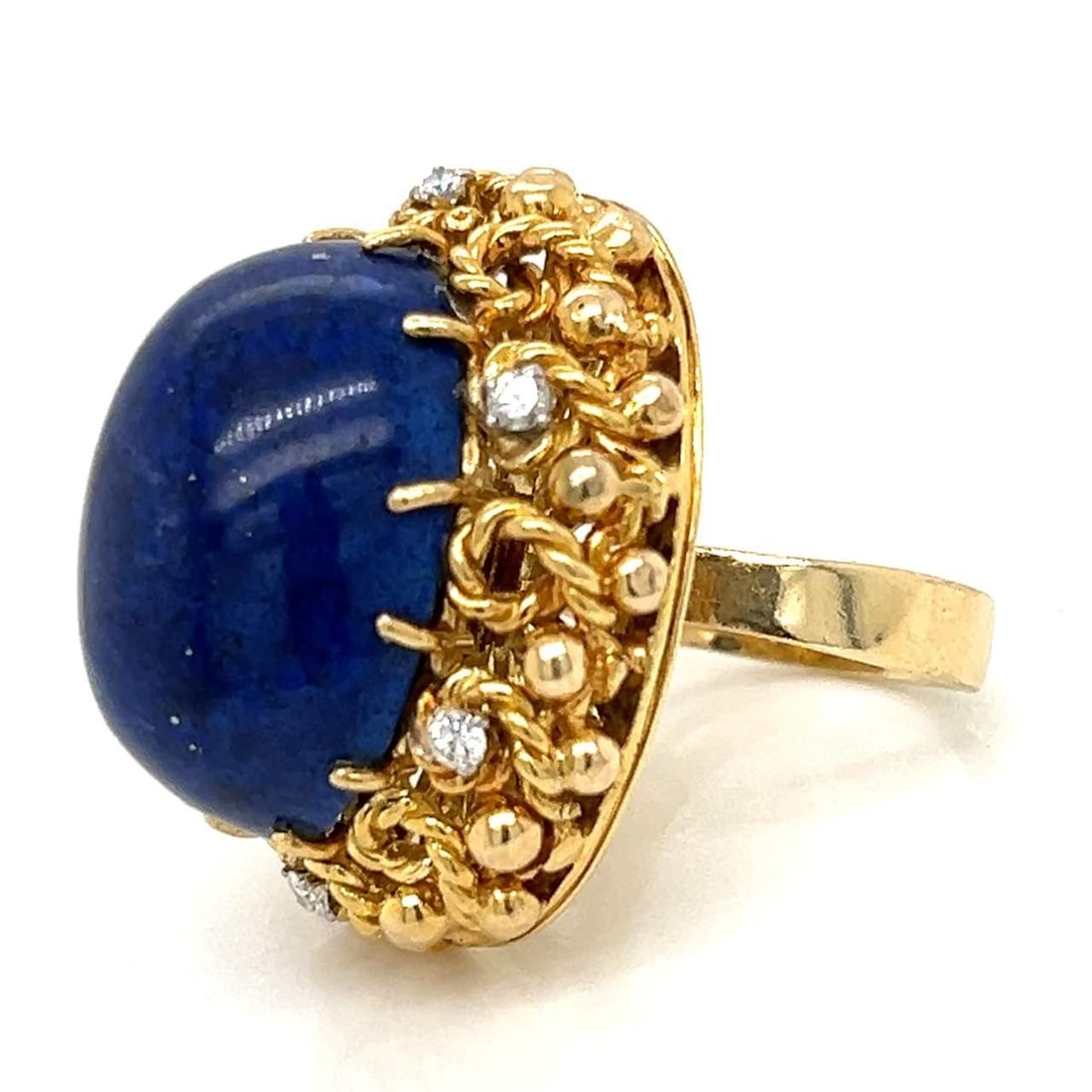 1960's 14K Yellow Gold Lapis Lazuli Diamond Ring 0.35 Ct: 1960's 14K Yellow Gold Lapis Lazuli Diamond Ring 0.35 Ct This stunning 1960's ring features a luxurious 14K yellow gold setting adorned with deep blue lapis lazuli and sparkling diamonds. The ring wei