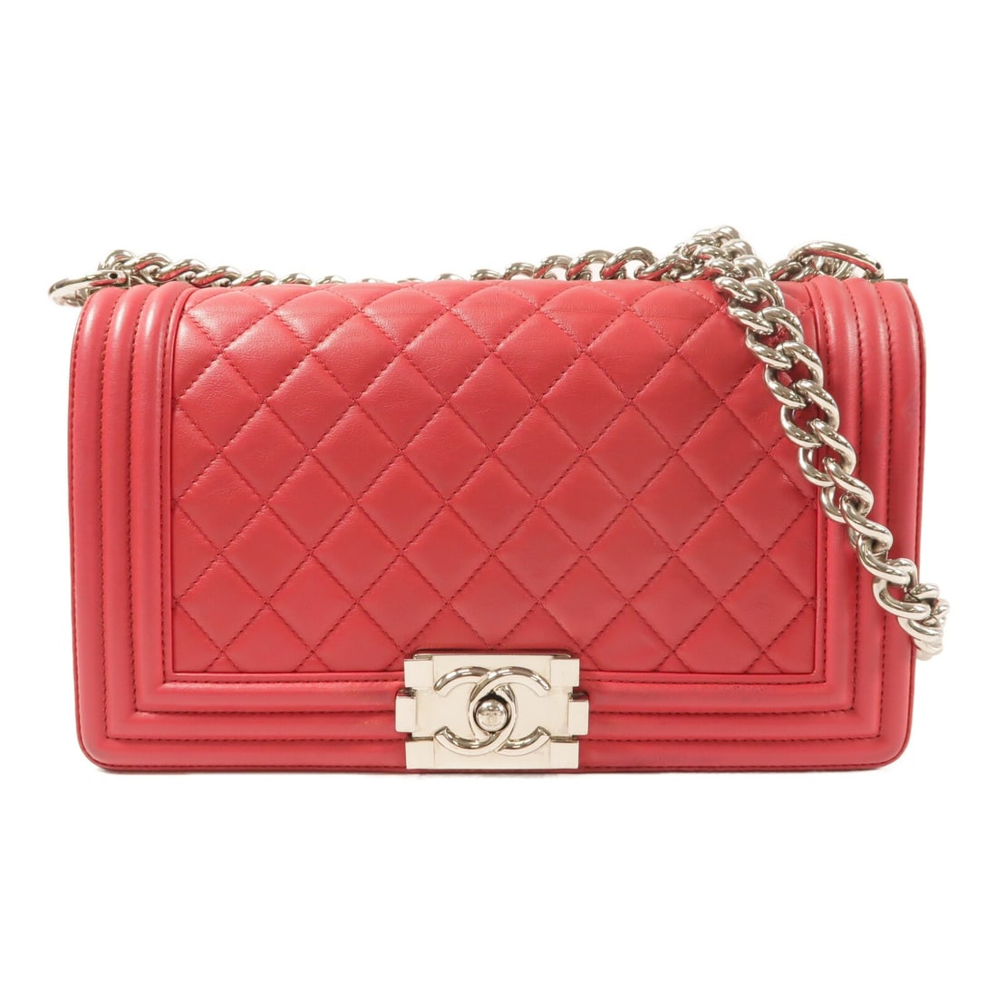 Pink Lambskin Boy 25 Shoulder Bag by CHANEL with Silver Tone Chain: Pink Lambskin Boy 25 Shoulder Bag by CHANEL with Silver Tone Chain This CHANEL Boy 25 shoulder bag features a pink lambskin leather exterior and a chain strap. Designed for women, it offers a stylish 