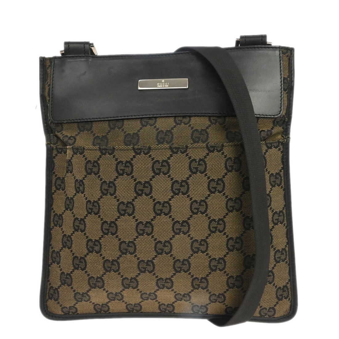 Gucci GG Brown Black Canvas Vintage Shoulder Bag: Gucci GG Brown Black Canvas Vintage Shoulder Bag This vintage Gucci shoulder bag features the iconic GG pattern on brown coated canvas with black accents. Designed for casual use, it has a small size 