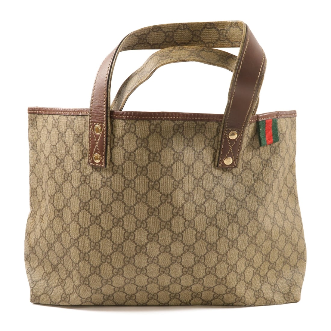 Gucci GG Brown Coated Canvas Tote with Gold Hardware: Gucci GG Brown Coated Canvas Tote with Gold Hardware This Gucci tote bag features a brown PVC coated canvas exterior with GG pattern and gold tone hardware. Designed for women, it offers a spacious in