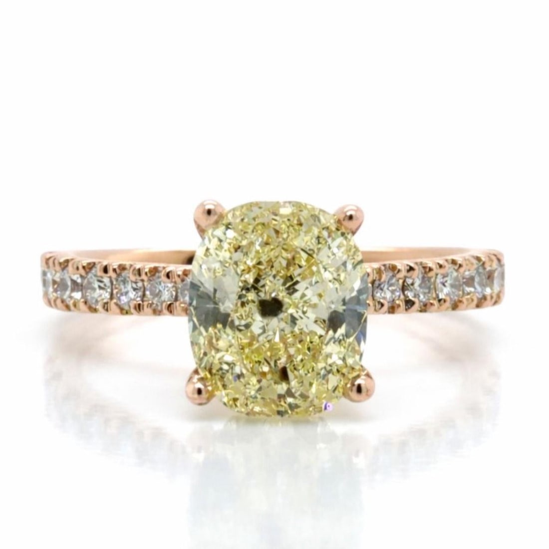 Cushion Cut 1.51 Ct Diamond Ring in 18K Rose Gold with GIA Certification: Cushion Cut 1.51 Ct Diamond Ring in 18K Rose Gold with GIA Certification This elegant ring features an 18K rose gold setting adorned with a GIA certified 1.51 carat cushion-cut diamond of Y-Z color an