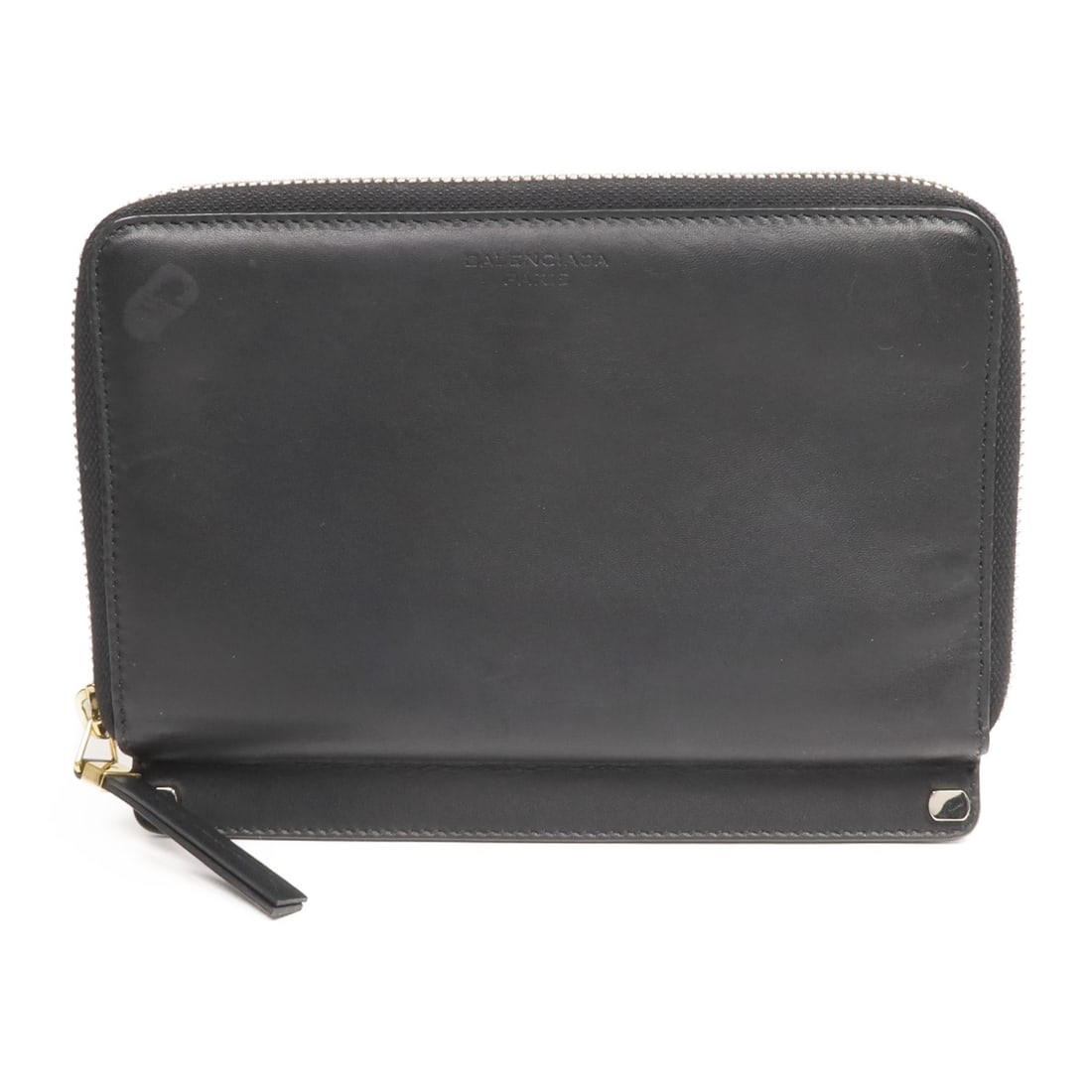 Black Calfskin Around Long Wallet by Balenciaga: Black Calfskin Around Long Wallet by Balenciaga This Balenciaga round zip wallet is crafted from black calfskin leather and designed in an around long wallet style. It features a regular size and show