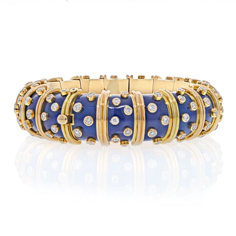 Schlumberger Blue Enamel Diamond Bangle in Platinum and 18K Gold by Tiffany & Co: Schlumberger Blue Enamel Diamond Bangle in Platinum and 18K Gold by Tiffany & Co This Tiffany & Co. Schlumberger bracelet features a wide bangle design crafted from platinum and 18K yellow gold. The b