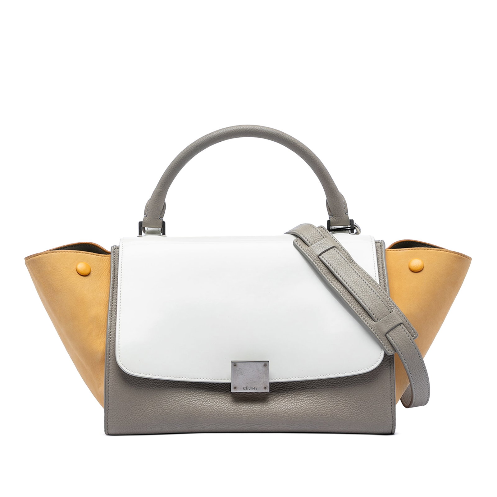 Celine Trapeze Small Satchel in Tricolor Leather with Top Handle and Strap: Celine Trapeze Small Satchel in Tricolor Leather with Top Handle and Strap This Celine Small Tricolor Leather Trapeze Satchel features a structured leather body with a rolled leather top handle and a 