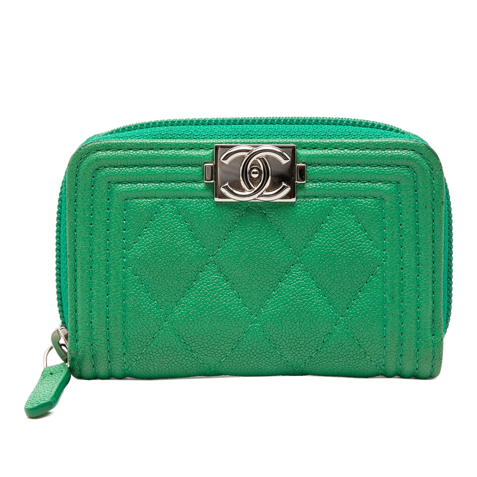 Chanel Boy quilted caviar leather coin pouch green: Chanel Boy quilted caviar leather coin pouch green This Chanel coin pouch features a quilted caviar leather exterior in green, accented with a zip closure and interior open compartments for convenient