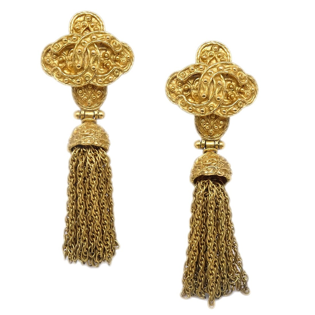 Chanel Gold-tone Fringe Dangle Clip-On Earrings 94A: Chanel Gold-tone Fringe Dangle Clip-On Earrings 94A Elevate your accessory collection with these stunning Chanel Fringe Dangle Clip-On Earrings, expertly crafted in France. These earrings feature a lu