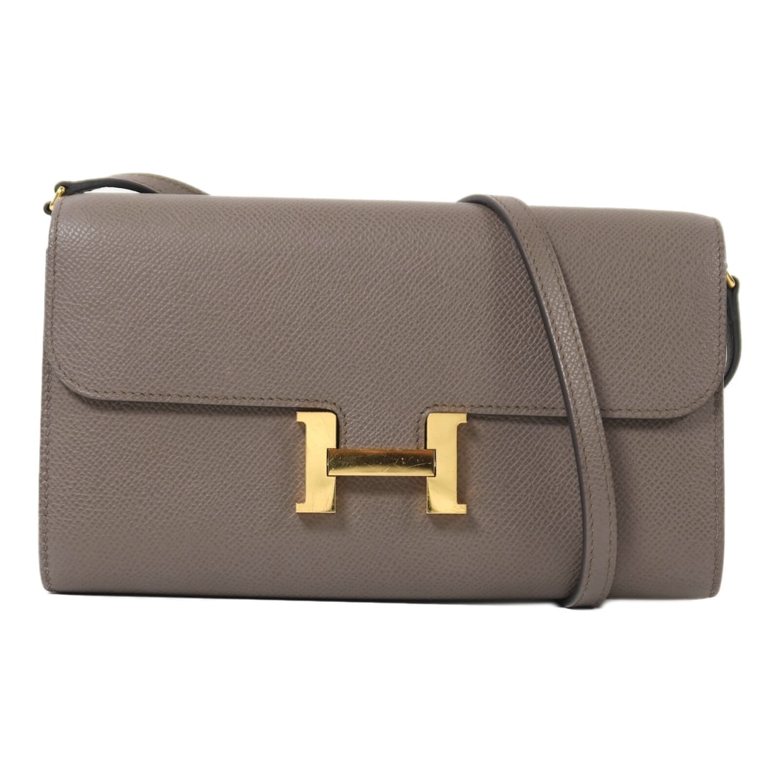 Hermes Constance To Go Etain Gray Calfskin Shoulder Bag GHW: Hermes Constance To Go Etain Gray Calfskin Shoulder Bag GHW This Hermes Constance To Go shoulder bag is crafted from Taurillon Clemence calfskin leather in a sophisticated gray tone. Featuring gold-to