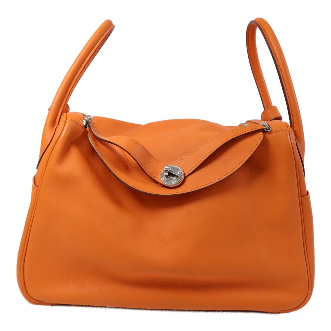 Hermes Lindy 34 Orange Swift Leather Shoulder Bag with Palladium Hardware: Hermes Lindy 34 Orange Swift Leather Shoulder Bag with Palladium Hardware This Hermes Lindy 34 is a versatile 2-way shoulder bag crafted from orange calfskin leather, known for its soft texture and du