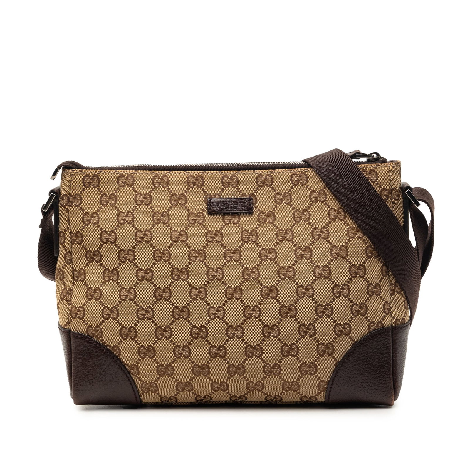 Gucci GG Canvas Beige Crossbody Bag: Gucci GG Canvas Beige Crossbody Bag This Gucci GG Canvas Crossbody bag features a beige canvas body with leather trim, an adjustable flat strap, a top zip closure, and an interior zip pocket. Made in 