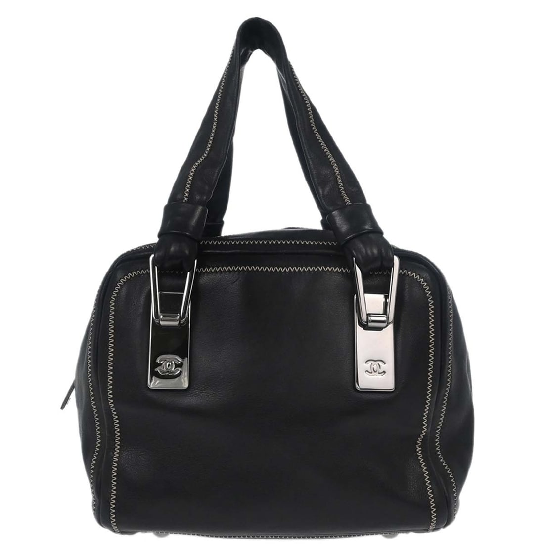 Black Leather CC Bowler Bag by Chanel 16cm x 15cm x 20cm: Black Leather CC Bowler Bag by Chanel 16cm x 15cm x 20cm This Chanel CC Bowler bag is crafted from black leather and features a classic design suitable for women. It is made in France and offers a com