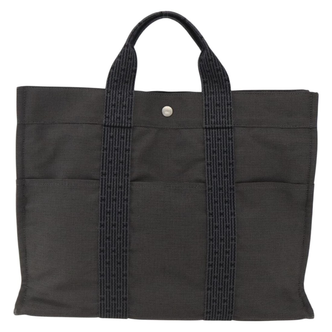 Gray Canvas Fourre-tout Herline Tote Bag by Hermes 42cm: Gray Canvas Fourre-tout Herline Tote Bag by Hermes 42cm The Hermes Fourre-tout Herline is a women's tote bag crafted from gray canvas. It features spacious dimensions and is suitable for everyday use.