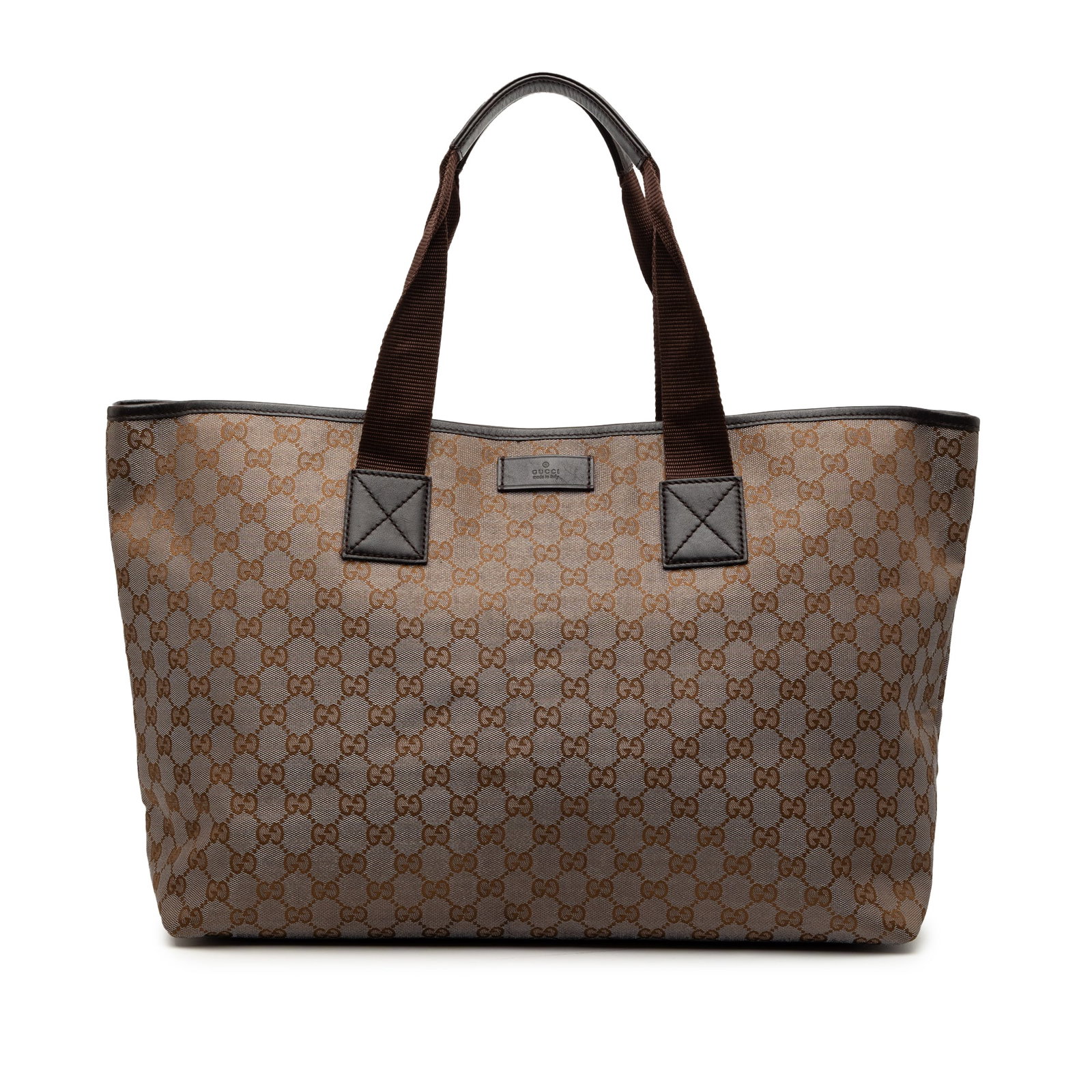Beige Canvas Gucci GG Tote with Leather Trim and Magnetic Closure: Beige Canvas Gucci GG Tote with Leather Trim and Magnetic Closure This Gucci GG Canvas Tote features a canvas body with leather trim, flat handles, an open top with magnetic closure, and interior zip 