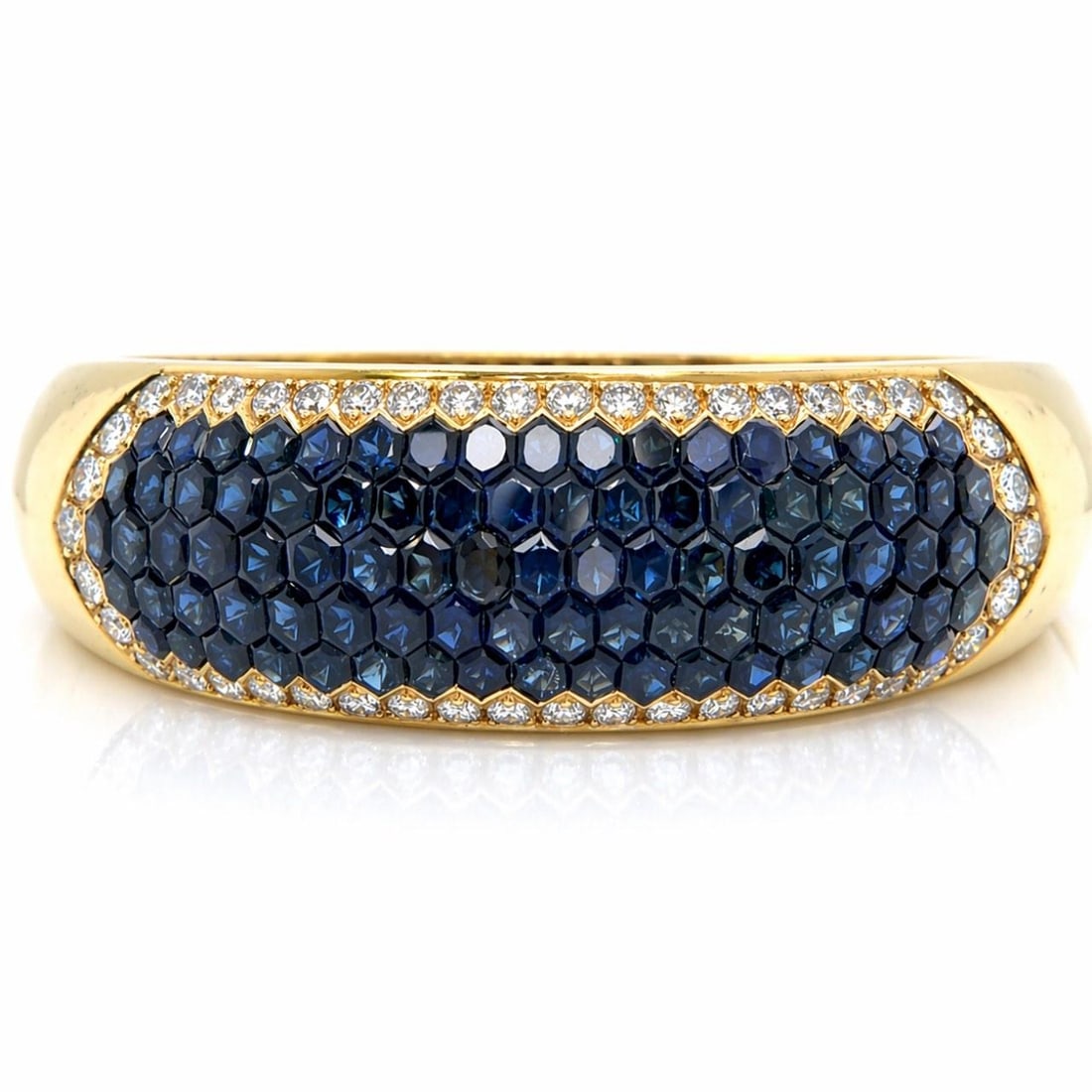 Sapphire and Diamond Bangle in 18K Yellow Gold 7.5 Inch 80.8g: Sapphire and Diamond Bangle in 18K Yellow Gold 7.5 Inch 80.8g This sophisticated bangle bracelet is crafted from 18K yellow gold and features 89 sapphires with an approximate total weight of 22.00 car