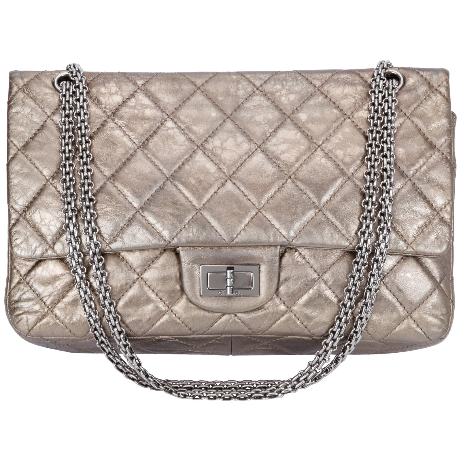 Chanel Dark Gold Metallic Reissue Jumbo Flap Bag 2006/2008: Chanel Dark Gold Metallic Reissue Jumbo Flap Bag 2006/2008 This stunning Chanel Metallic Reissue Jumbo Flap Bag is a timeless piece that showcases the elegance and craftsmanship of the iconic brand. M