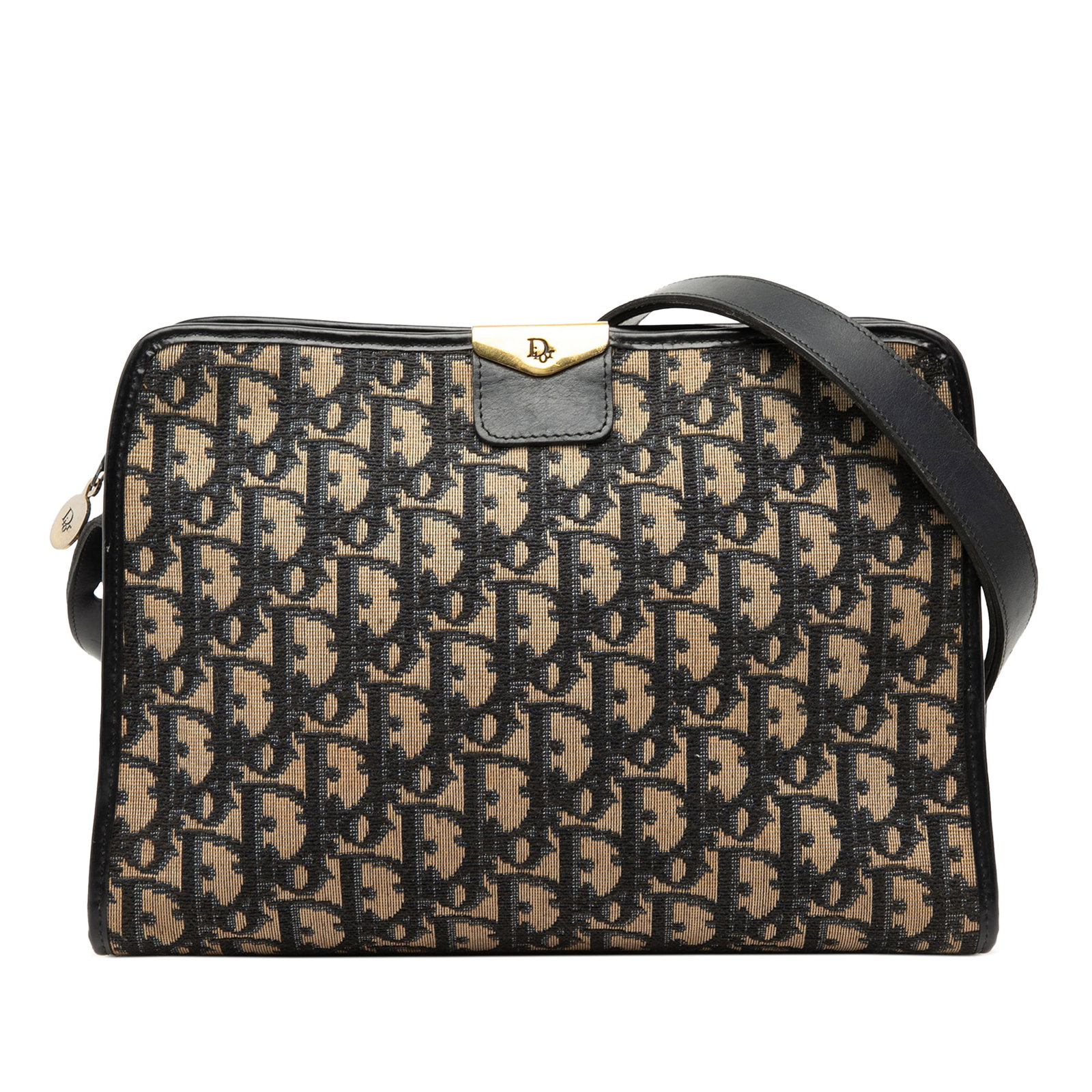 Dior blue canvas shoulder bag Diorissimo Trotter: Dior blue canvas shoulder bag Diorissimo Trotter This Diorissimo Trotter Canvas Shoulder Bag by Dior features a blue canvas body with leather trim, an adjustable flat leather strap, a top zip closure,