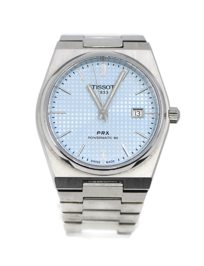 Tissot PRX 40MM Stainless Steel Analog Wristwatch: Tissot PRX 40MM Stainless Steel Analog Wristwatch This Tissot PRX wristwatch features a 40mm stainless steel case and matching stainless steel band. Designed for men, it offers an analog display and i