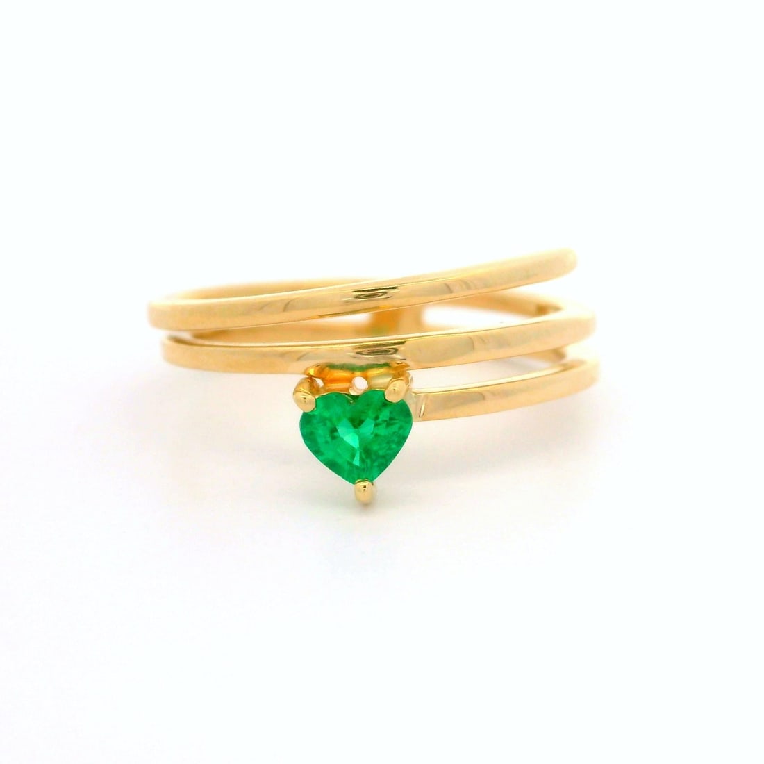 14k Yellow Gold 0.24ctw Heart Emerald Wrap Band Ring: 14k Yellow Gold 0.24ctw Heart Emerald Wrap Band Ring This stunning wrap band ring features a captivating heart-shaped emerald, showcasing a vivid green color that exudes elegance and charm. Crafted fr