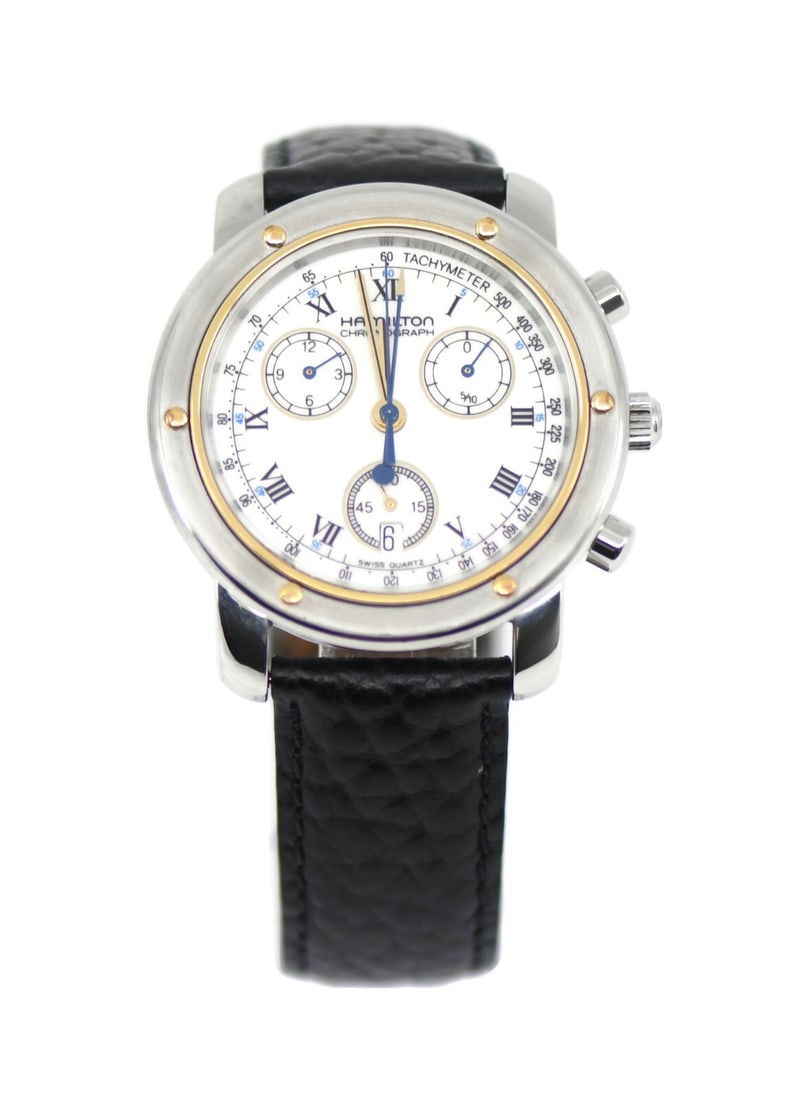 Hamilton 8800 Chronograph Stainless Steel Analog Watch: Hamilton 8800 Chronograph Stainless Steel Analog Watch This Hamilton Chronograph wristwatch combines elegance and functionality with its classic design. Crafted with a durable stainless steel case mea