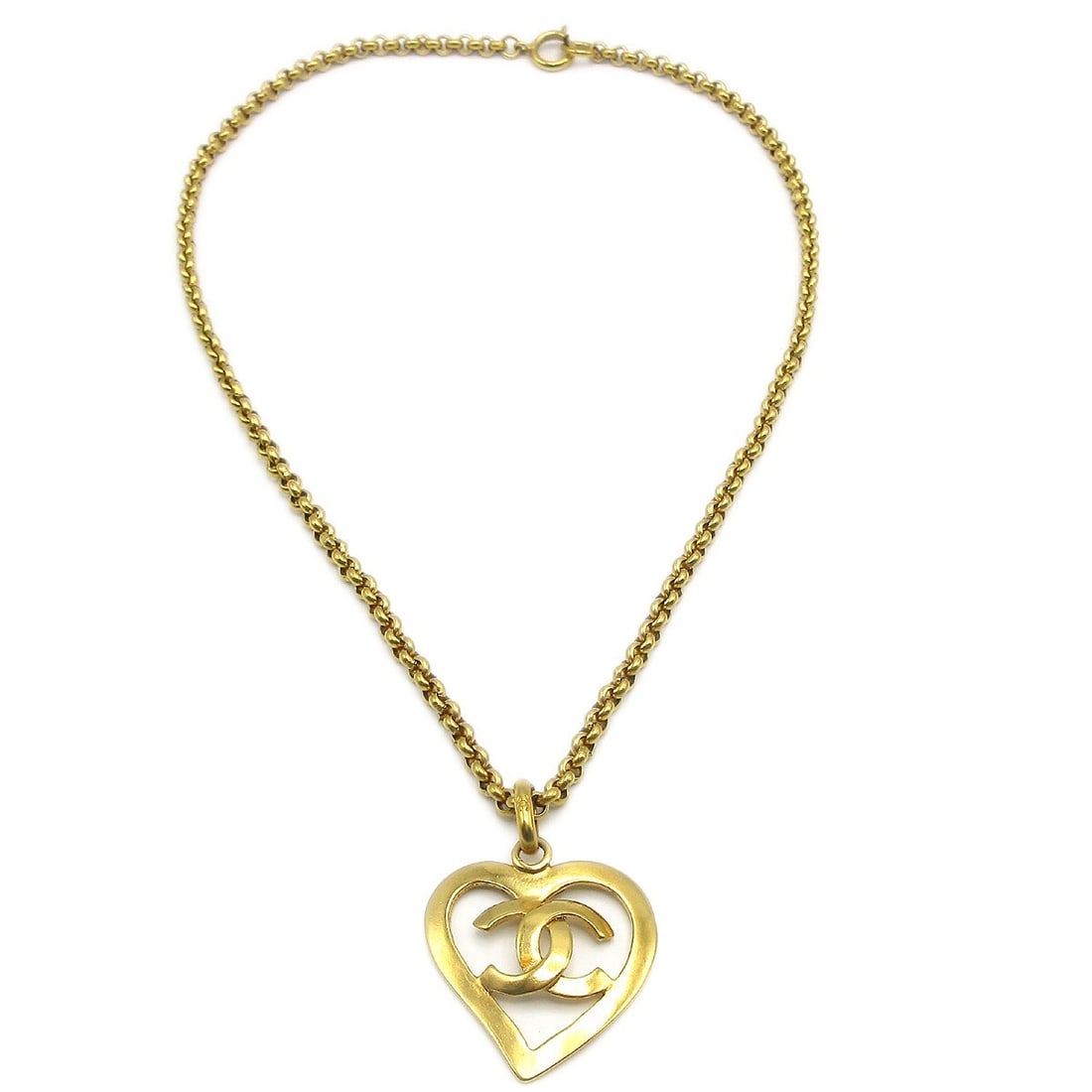 Chanel Vintage Gold-Plated Heart Pendant Necklace 95P: Chanel Vintage Gold-Plated Heart Pendant Necklace 95P This exquisite Chanel Heart Chain Pendant Necklace is a stunning accessory that exudes elegance. Crafted from gold-plated metal, it features a cha