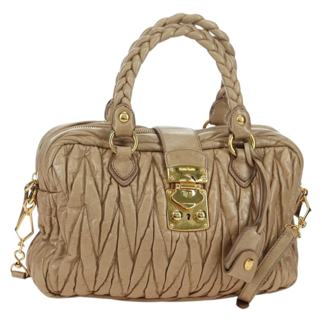 Miu Miu Beige Gold Leather Matelasse 2way Shoulder Bag: Miu Miu Beige Gold Leather Matelasse 2way Shoulder Bag This Miu Miu Matelasse handbag features a beige and gold leather exterior and offers versatile carrying options with both handles and a detachabl