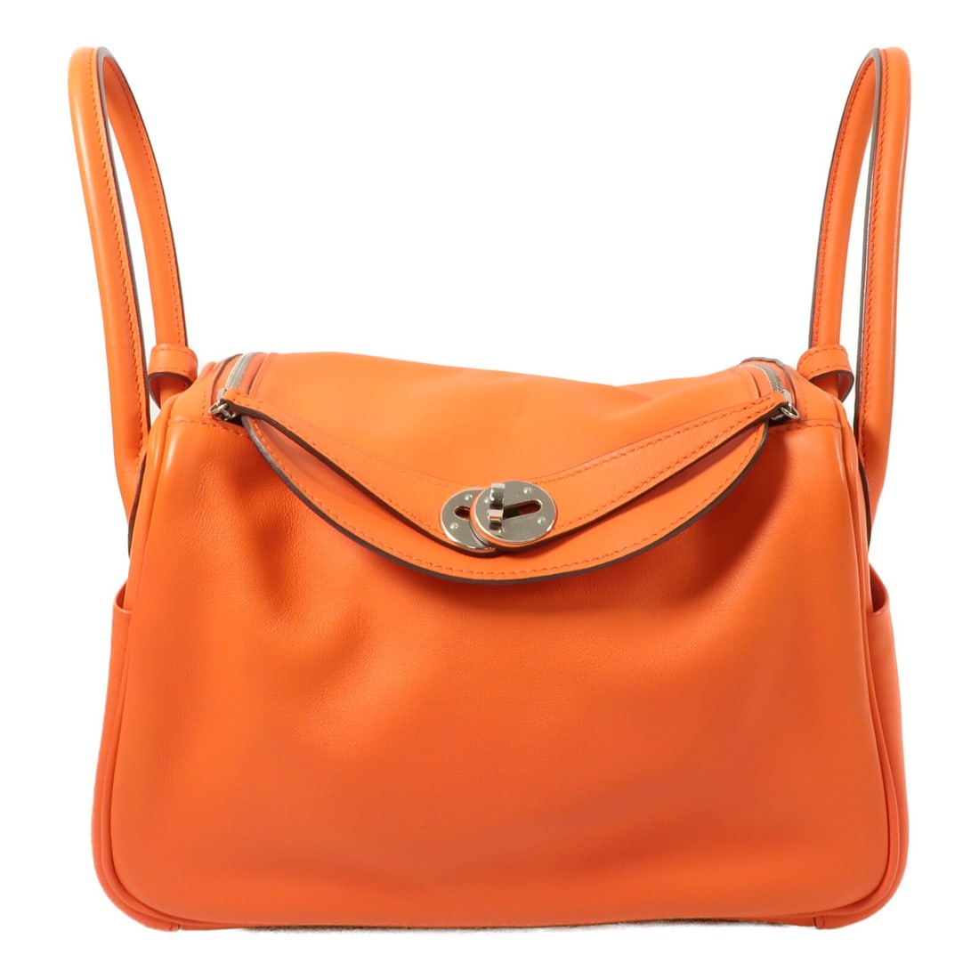 Hermes Lindy 26 Orange Swift Leather Shoulder Bag with Palladium Hardware: Hermes Lindy 26 Orange Swift Leather Shoulder Bag with Palladium Hardware This Hermes Lindy 26 is a versatile two-way shoulder bag crafted from Vaux Swift calfskin leather in a vibrant orange color. D